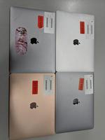 Assorted Apple laptops